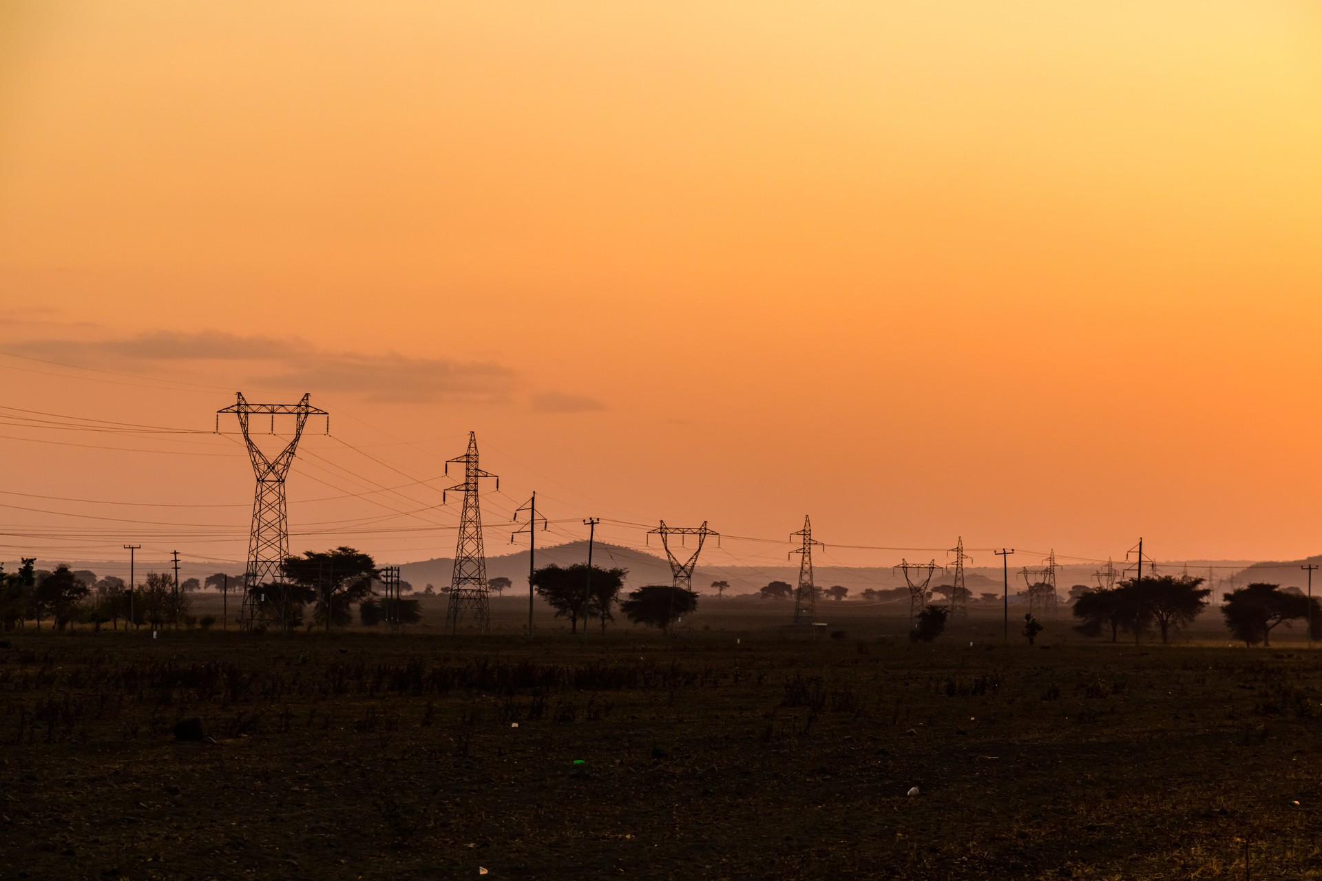 High voltage power line at sunaet in a wilderness at Tanzania
